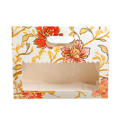 Floral-patterned box with a window on a white background