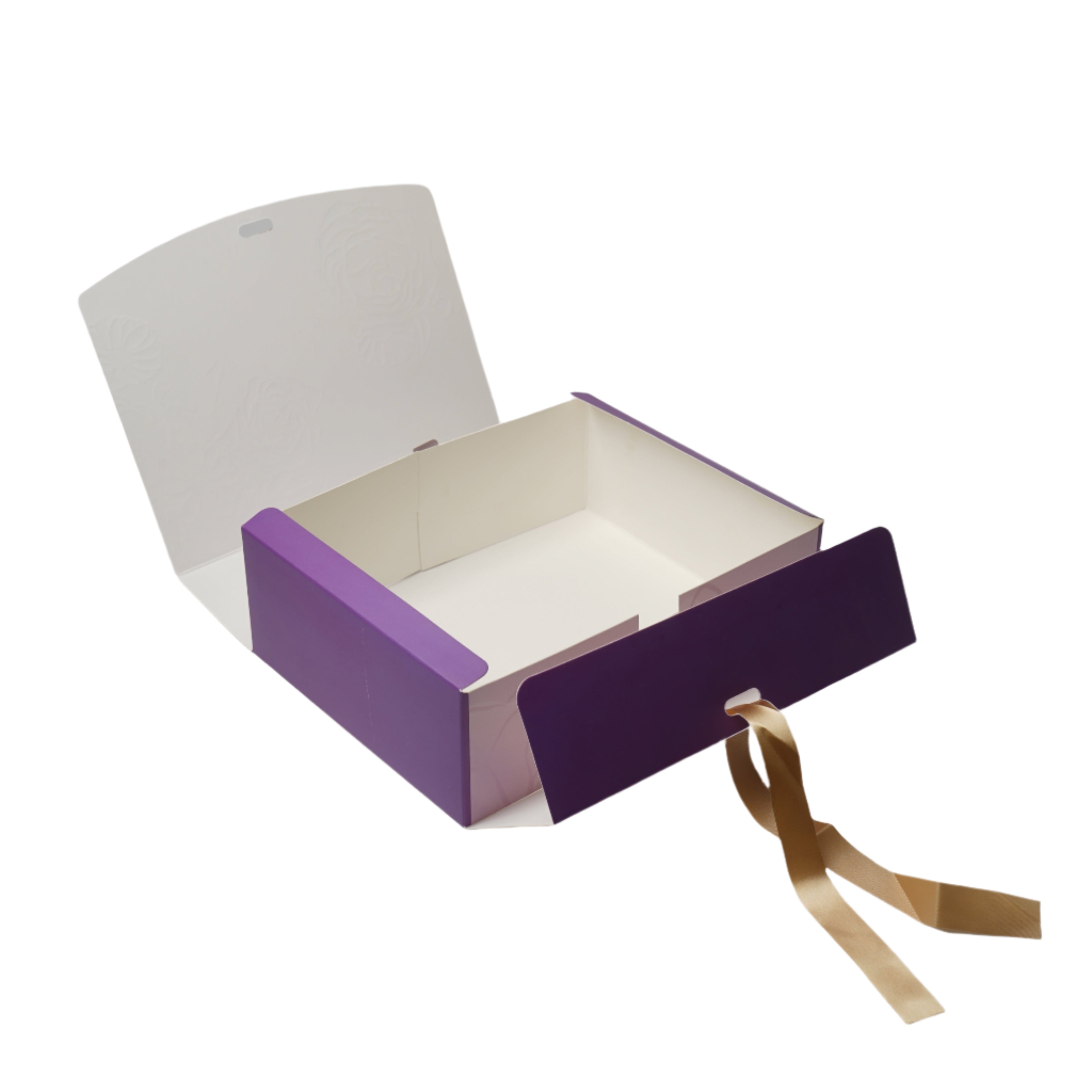 Open purple gift box with a gold ribbon on a white background