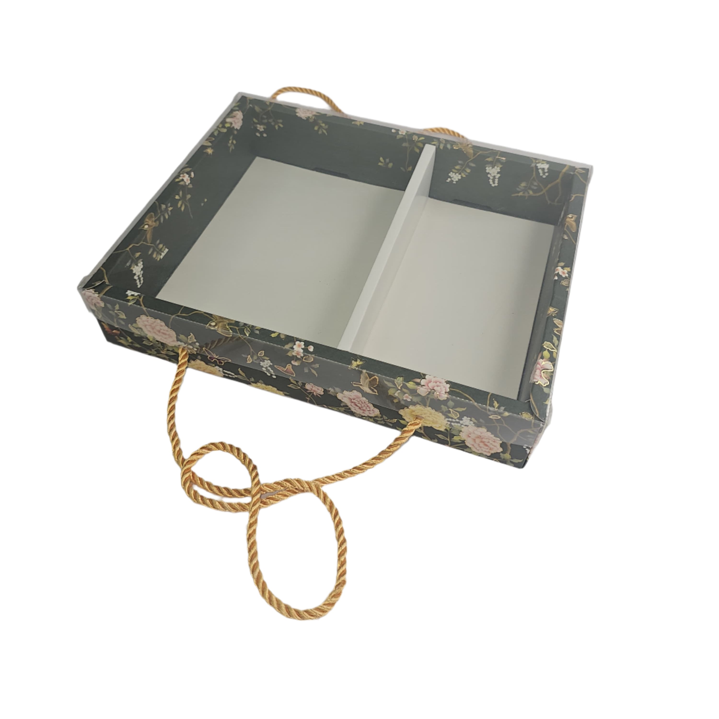 Decorative box with floral pattern and gold rope on a gray background