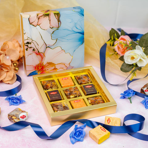 9 CAVITY SLIDER CHOCOLATE BOX WITH PRINTED SLEEVES AND GOLDEN TRAY (14*14*3 CM) (CK-2-B)