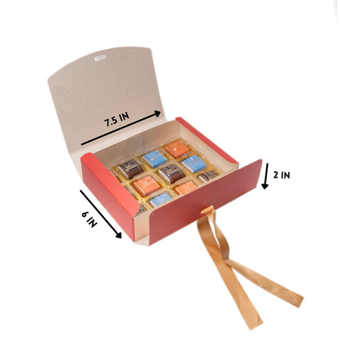 Open chocolate box with dimensions indicated on a white background