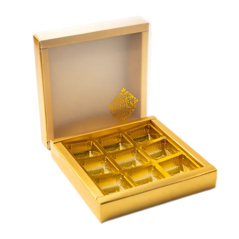 9 Cavity Chocolate Box With Golden Tray And Translucent PVC Sleeves (14*14*3 Cm) (CK-2)