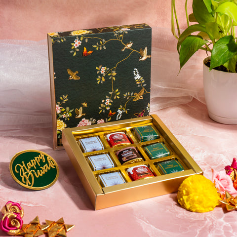 9 CAVITY SLIDER CHOCOLATE BOX WITH PRINTED SLEEVES AND GOLDEN TRAY (14*14*3 CM) (CK-2-EB)