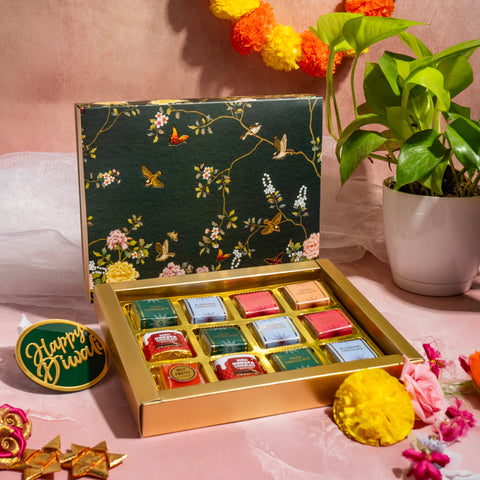 12 CAVITY CHOCOLATE BOX WITH PRINTED SLEEVES AND GOLDEN TRAY (19*14.4*3 CM) (CK-3-EB)
